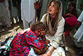 Jemima with a refugee child at Jalozai