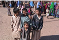 boys laughing outside the clinic at Jalozai
